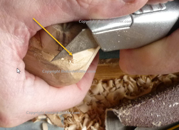 Stanley knife cutting down.